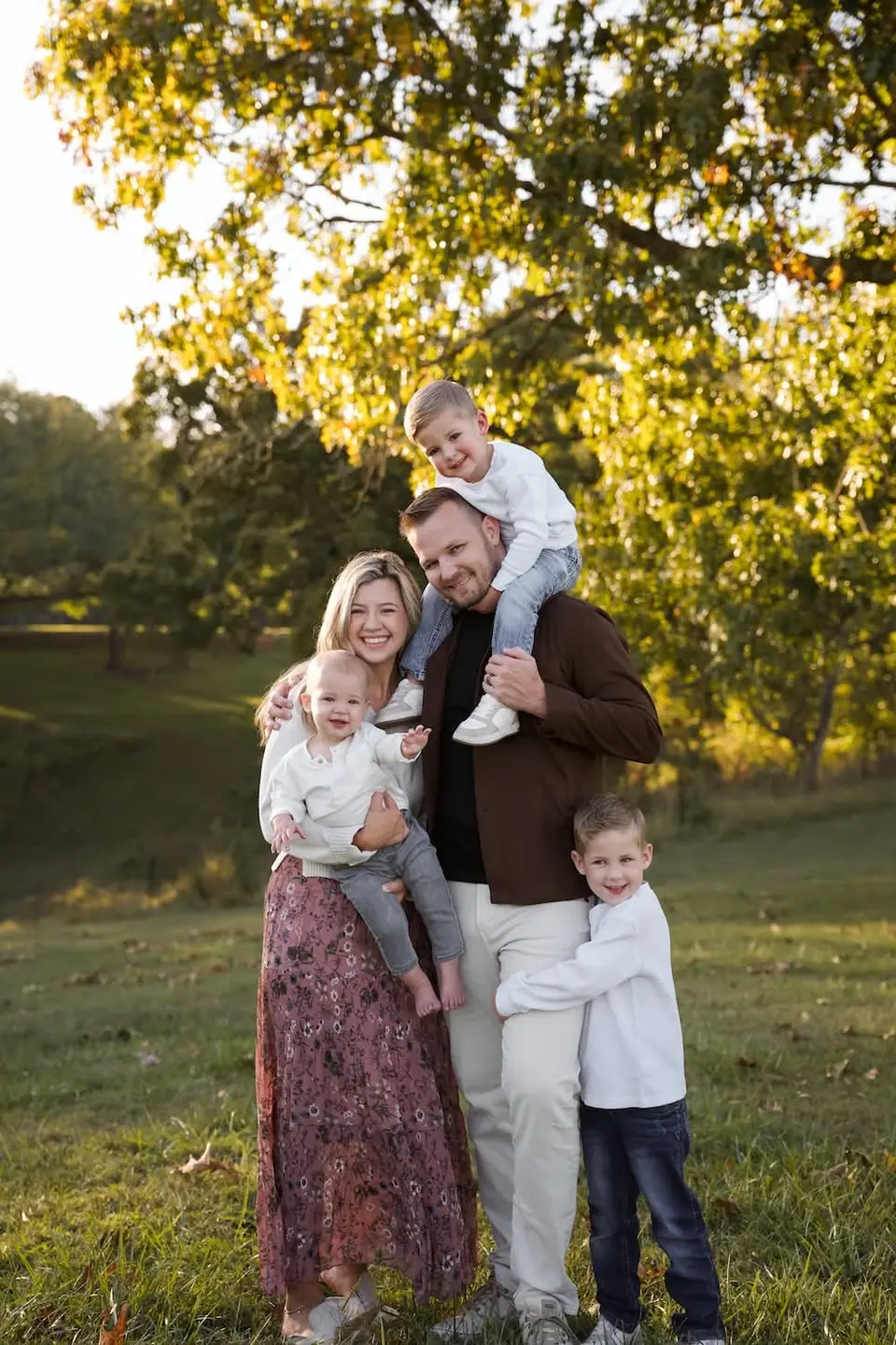 Me with my wife and our three sons, outdoors on a fall afternoon
